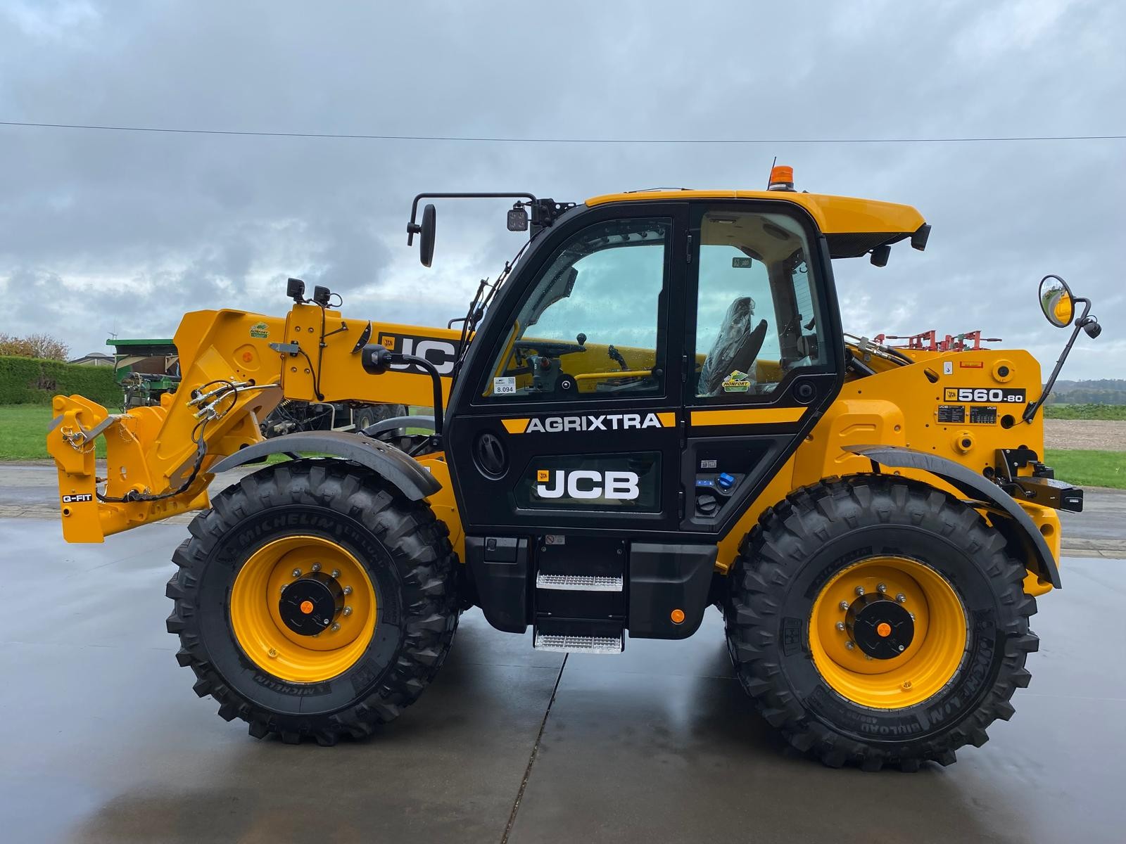Chargeur télescopique JCB 560-80 AGX DTVT Qfit