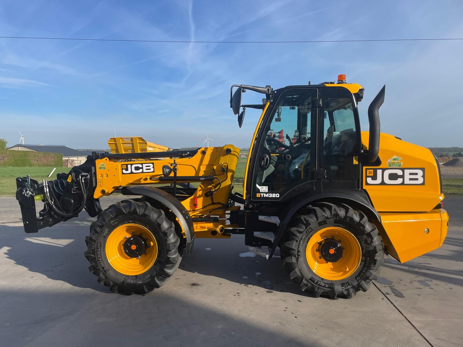 Chargeur télescopique JCB TM320 Qfit